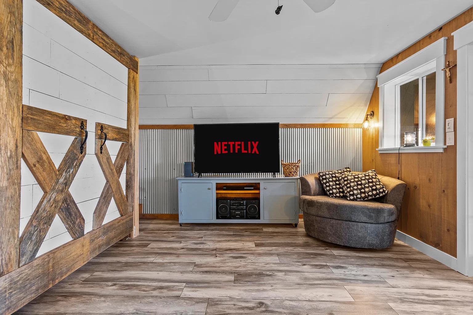 Upstairs queen bedroom with TV at Canyon Ridge Retreats A-frame cabin